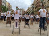 Perfomance del sector de l'hostaleria a la Plaça de la Font per reclamar mesures d'ajuda extraordinàries